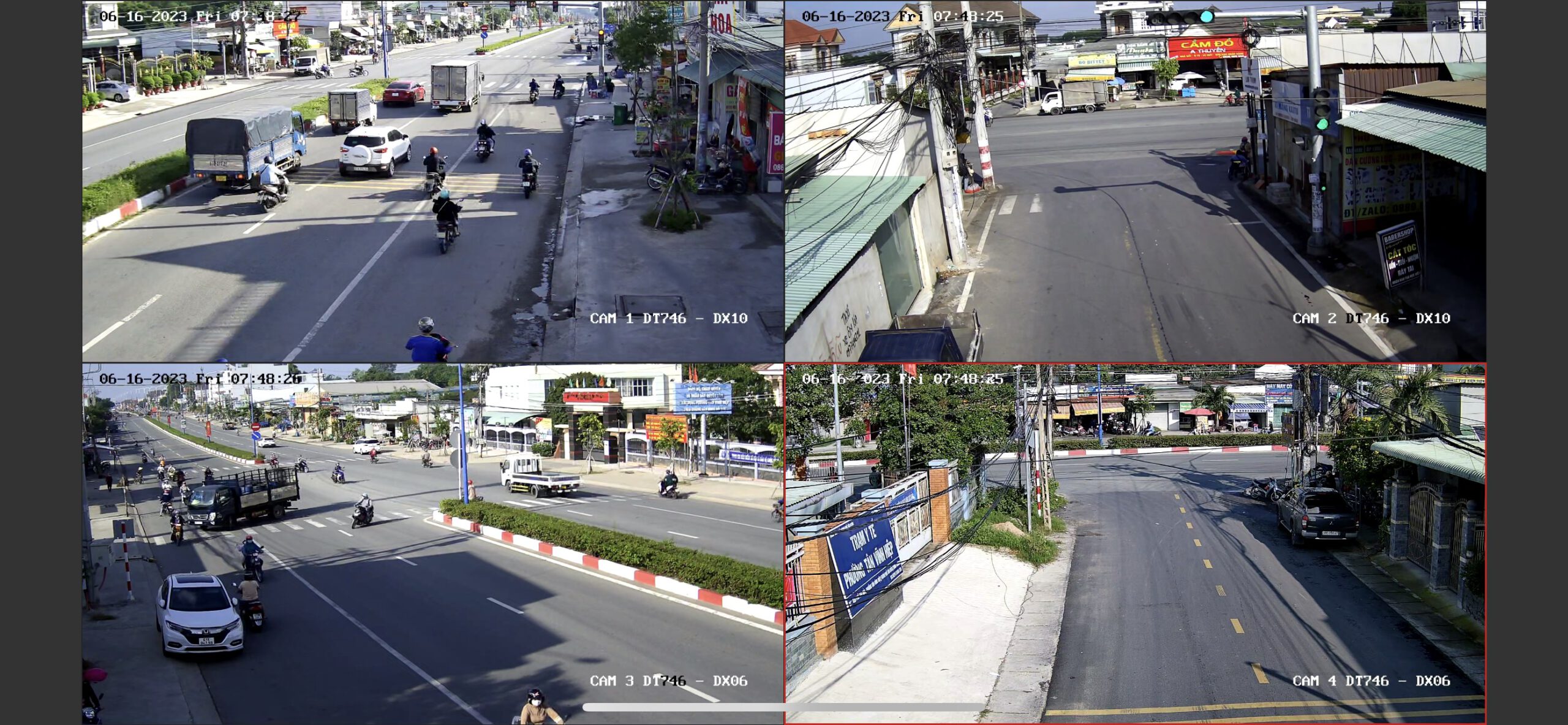Màn hình giám sát trung tâm hiển thị 4 kênh camera giao thông đang hoạt động.